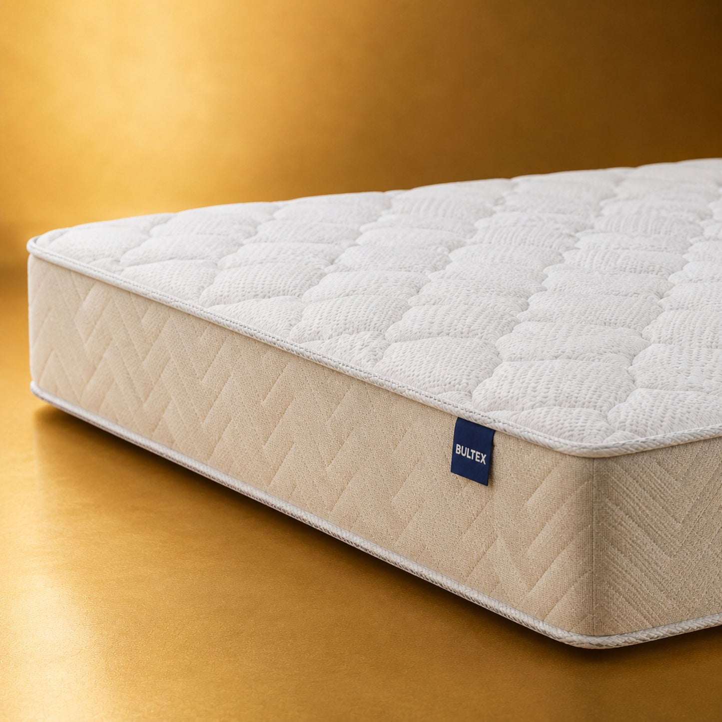 Detail_du_matelas_Bultex_Easy_Start_coutil_matelasse_et_finition_laterale_beige